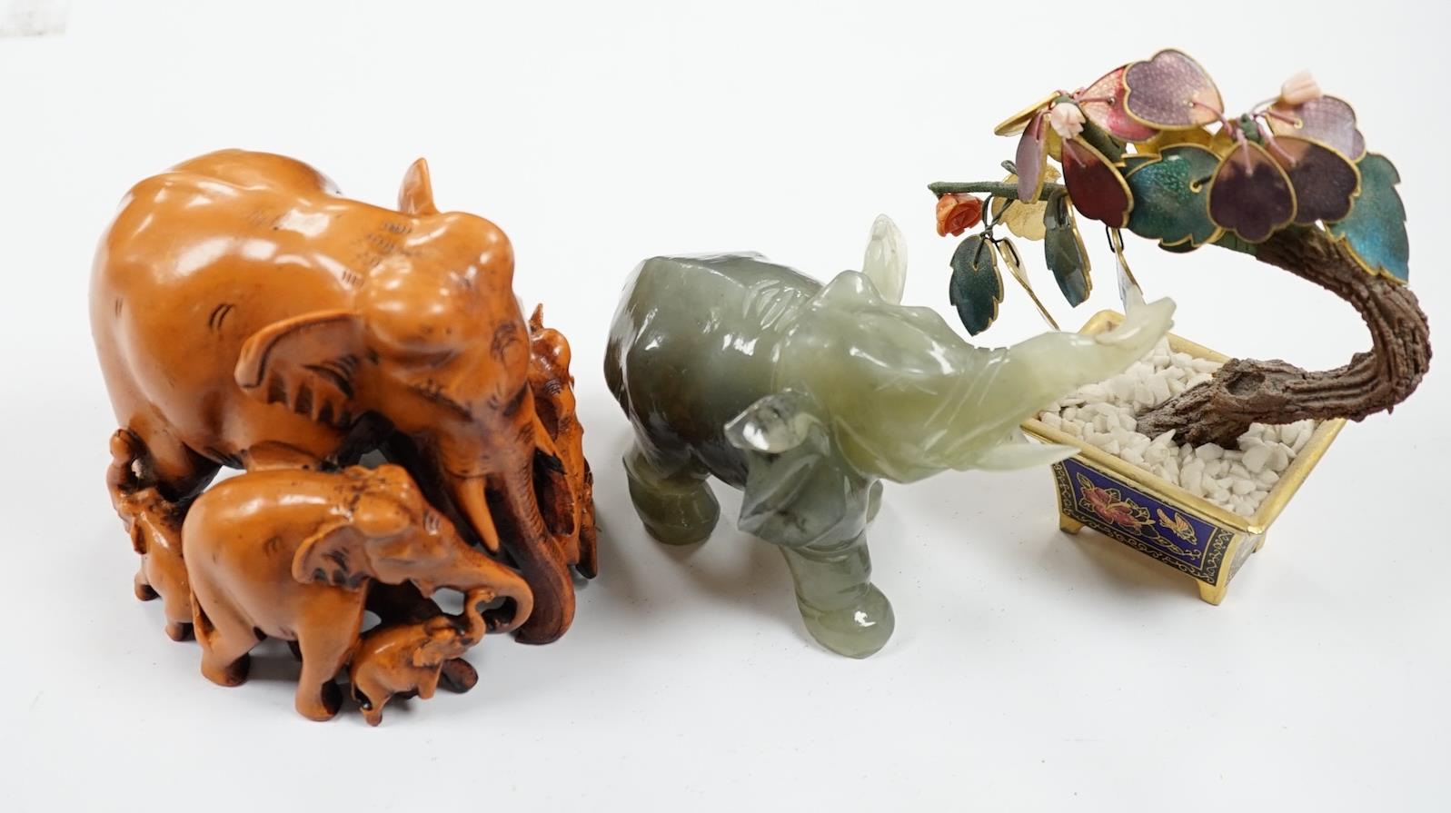 Assorted Chinese carvings, including enamel model bonsai trees, miniature ceramic folding screen, carved elephants, hardwood stands, and nephrite jade and green stone carved dragons, and horses, etc. Condition - varies